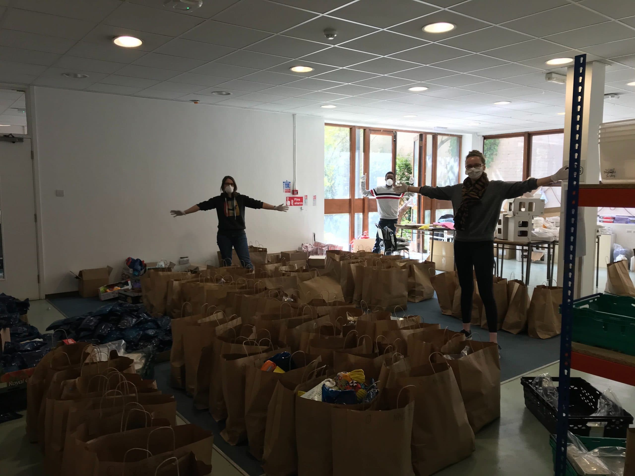 Dare to Care volunteers with packed care packages
